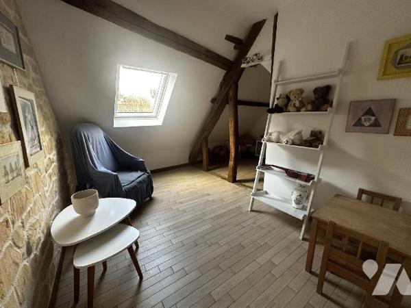 Centre-ville de SAINT JULIEN DU SAULT, Maison d'habitation comprenant au rez-de-chaussée : une ...
