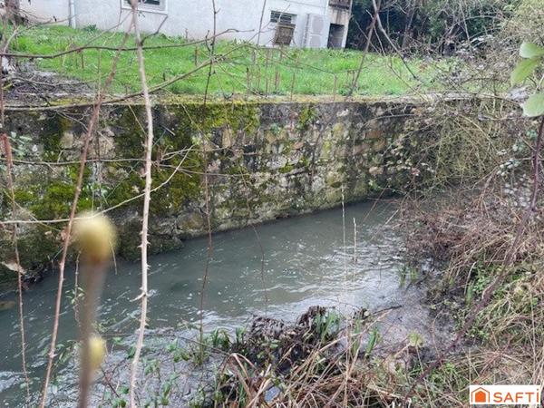 Beau terrain 961 m2 à bâtir sur 825 m2 - G1 et G2 - viabilisé - façade 19.77 ml - possibilité 2 lots - Gare routière - Ecoles