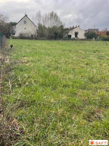 Beau terrain 961 m2 à bâtir sur 825 m2 - G1 et G2 - viabilisé - façade 19.77 ml - possibilité 2 lots - Gare routière - Ecoles