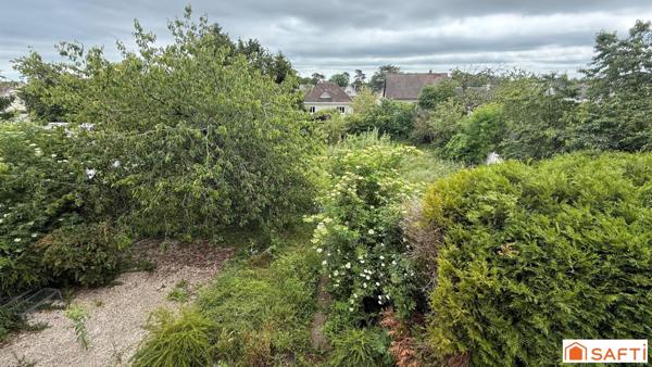 Maison bourgeoise avec jardin au centre ville