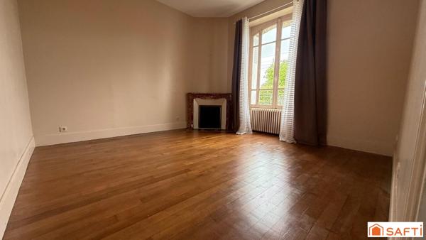 Maison bourgeoise avec jardin au centre ville