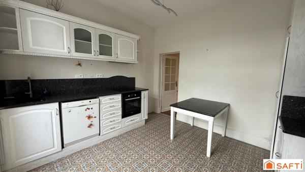 Maison bourgeoise avec jardin au centre ville