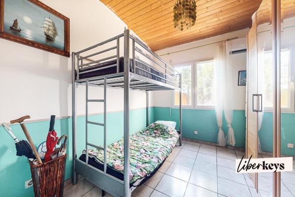 Maison T6 plain-pied garage, piscine, jardin.