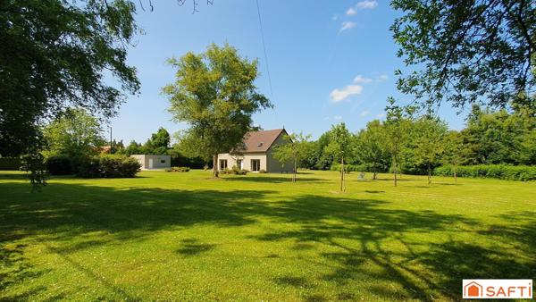 Confortable maison avec grand garage proche école et commerces