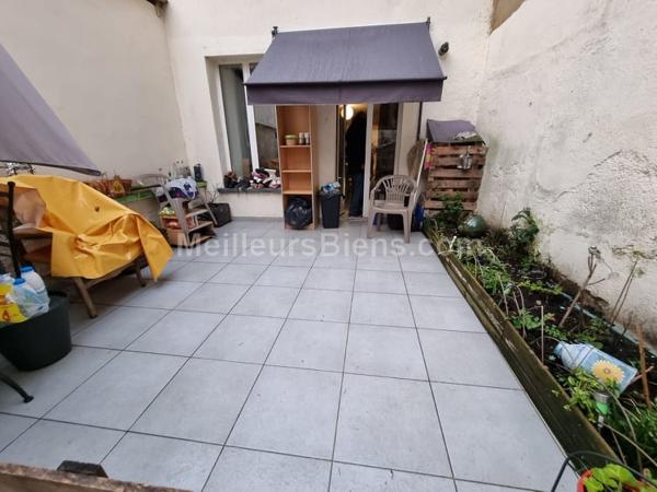 En centre ville, immeuble de rapport avec terrain