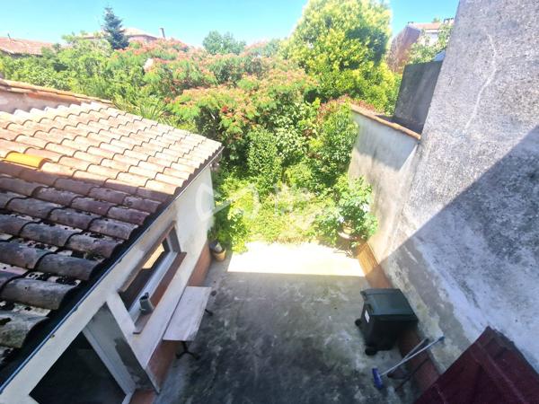 À vendre : Maison centre-ville  aavec jardin
