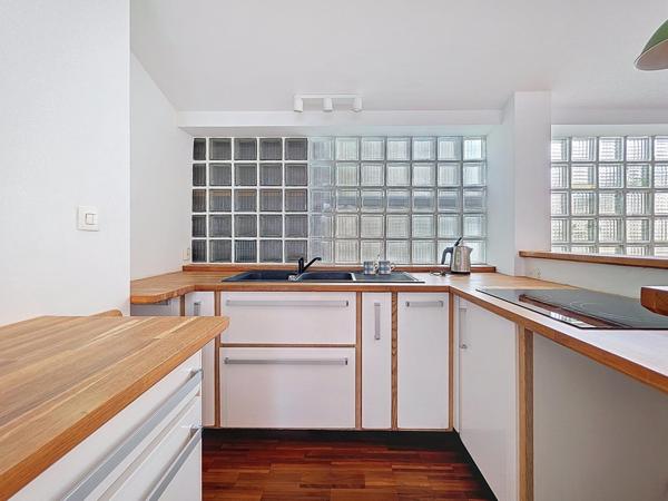 DUPLEX AVEC ROOFTOP, TERRASSE ET PARKING AUX LILAS