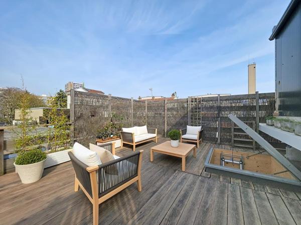 DUPLEX AVEC ROOFTOP, TERRASSE ET PARKING AUX LILAS