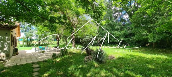 Grande maison + garage sur terrain de 6500 m² divisible