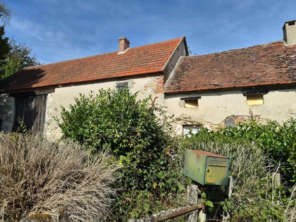 Belle longère à rénover avec grange et terrain