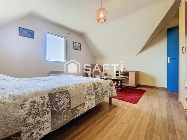 Maison familiale avec jardin et véranda à Briec