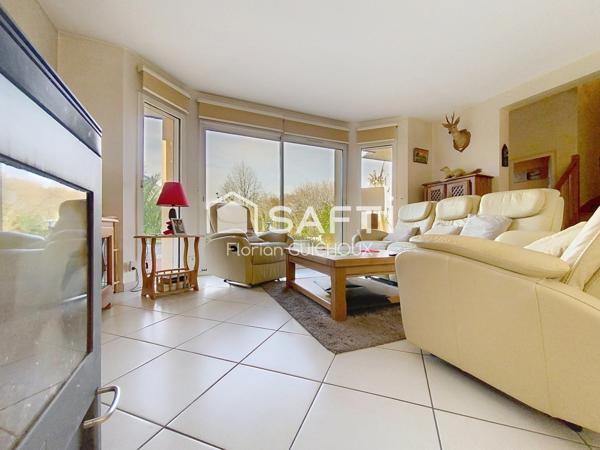 Maison familiale avec jardin et véranda à Briec