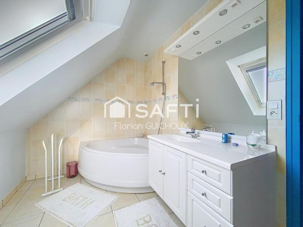 Maison familiale avec jardin et véranda à Briec