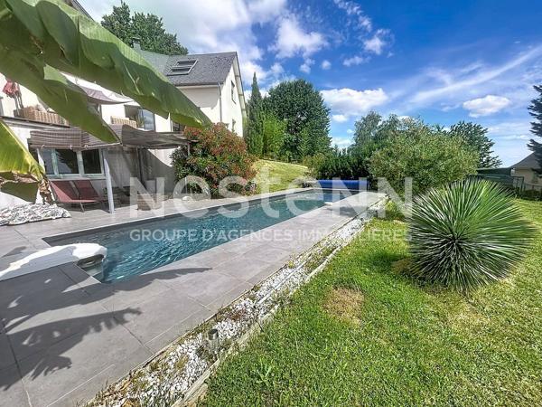 Maison atypique avec vue exceptionnelle sur les hauteurs d 'Allassac -3 chambres - sous-sol - garage - piscine -