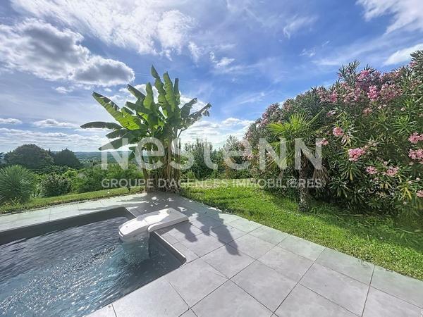 Maison atypique avec vue exceptionnelle sur les hauteurs d 'Allassac -3 chambres - sous-sol - garage - piscine -