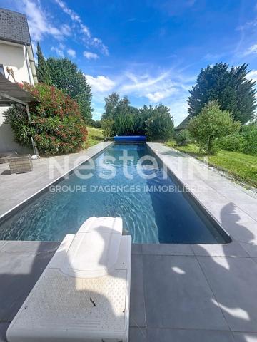 Maison atypique avec vue exceptionnelle sur les hauteurs d 'Allassac -3 chambres - sous-sol - garage - piscine -