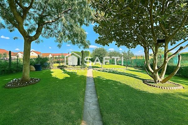 Maison de ville avec sous-sol complet et jardin