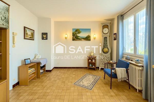 Maison de ville avec sous-sol complet et jardin