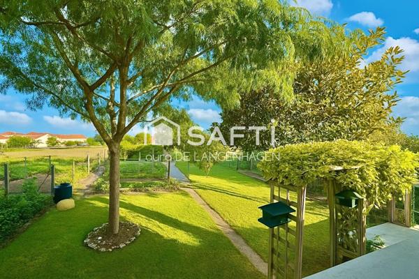 Maison de ville avec sous-sol complet et jardin