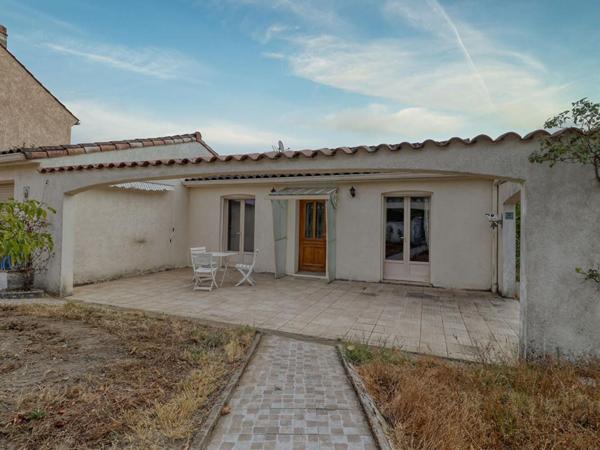 Maison de plain-pied de 110 m² - 3 chambres - Garage - Véranda -Terrain de 682 m²