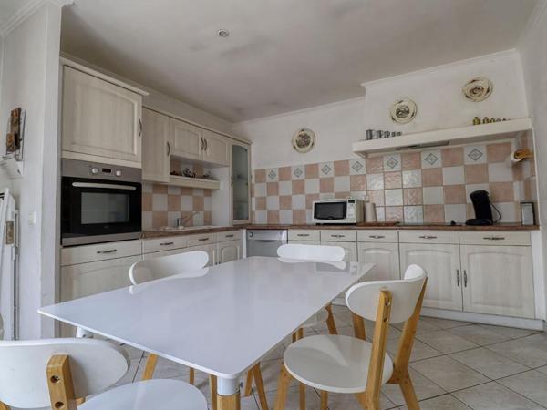 Maison de plain-pied de 110 m² - 3 chambres - Garage - Véranda -Terrain de 682 m²
