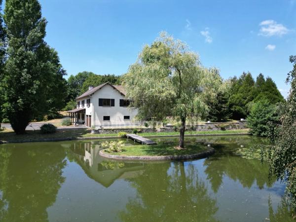 Maison 130m2 avec dépendance, plan d'eau et un hectare de terrain plat