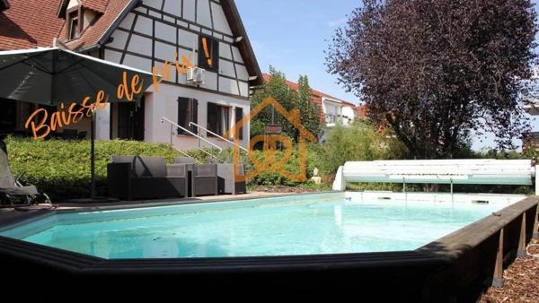 En exclusivité Jolie Maison de 150m² au sol à HOLTZHEIM avec piscine chauffée, climatisation sur 7 ares de terrain