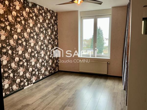 Appartement F4, d'environ 117 m2, avec terrasse, parking et cave