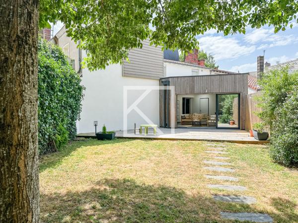 MAISON DE VILLE AVEC JARDIN ET GARAGE