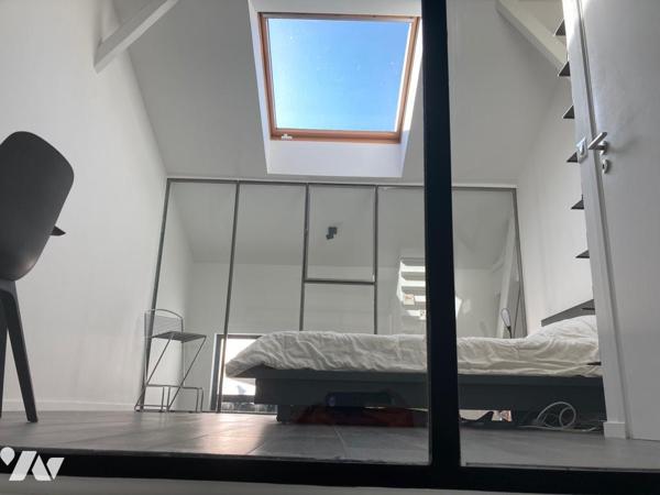 Sublime Loft en parfait état, niché dans une copropriété calme et recherchée