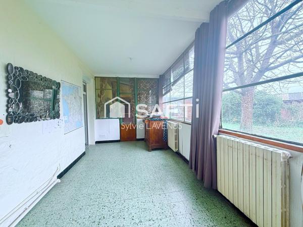 A Cuffies 02, maison avec 3 chambres, véranda, garage et dépendance sur son terrain de 391 m2.