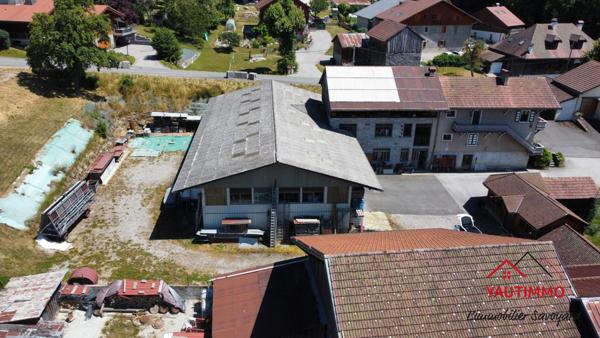 Villard (74420) Ensemble immobilier avec terrain constructible de 2 800 m² en zone UA – Villard, proche Boëge