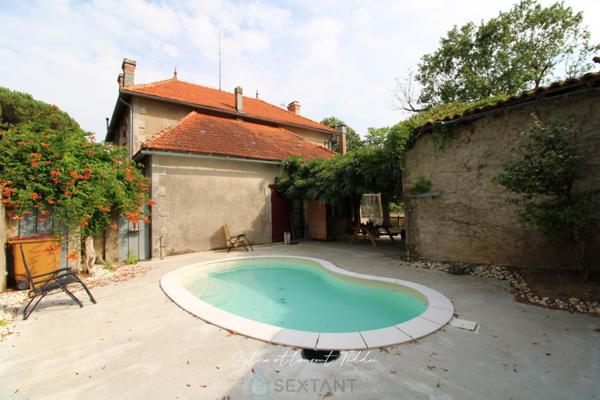 MAISON BOURGEOISE EN PIERRE RENOVEE AVEC PISCINE, DEPENDANCES ET PLUS DE 3,6 HECTARES DE TERRAIN