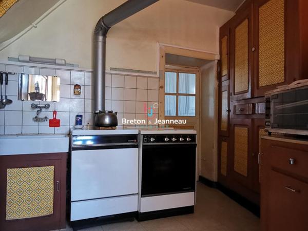 Maison de bourg à la Chapelle au Riboul