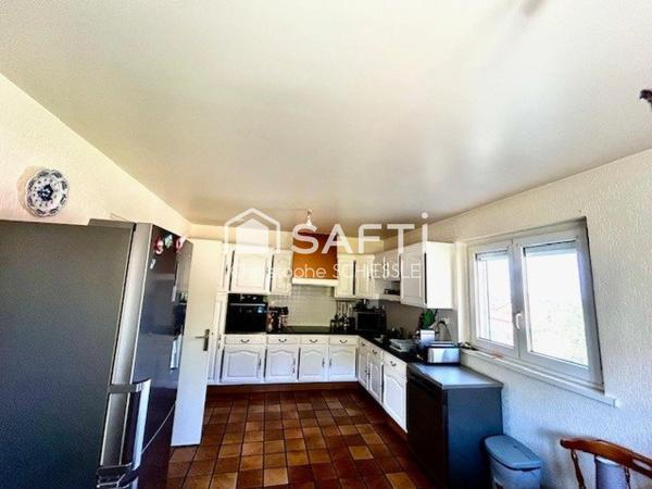 Maison T9 sur 30 ares de terrain