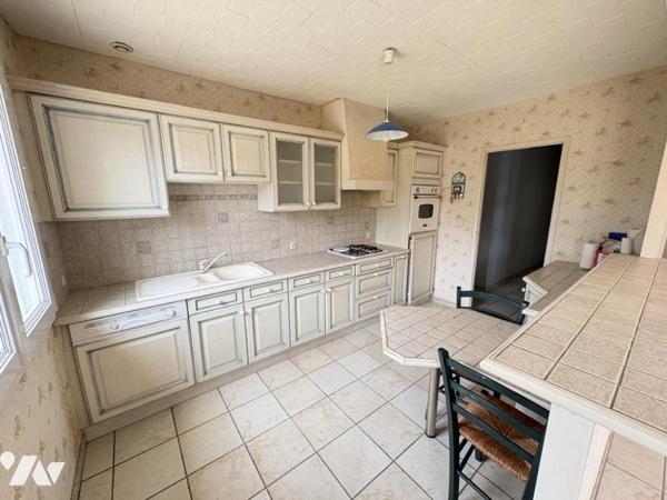 Maison familiale avec vie de plain-pied cinq chambres