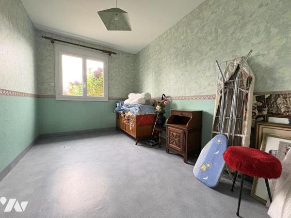 Maison familiale avec vie de plain-pied cinq chambres