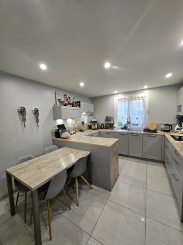 Maison 4 chambres avec garage et terrain clos