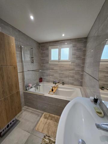 Maison 4 chambres avec garage et terrain clos