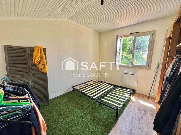 MAISON DE VILLAGE 3 CHAMBRES ET GARAGE A COULONGES SUR L'AUTIZE