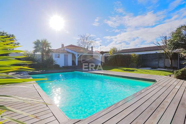 Maison  de plain pied, 5 chambres, garage, piscine.
