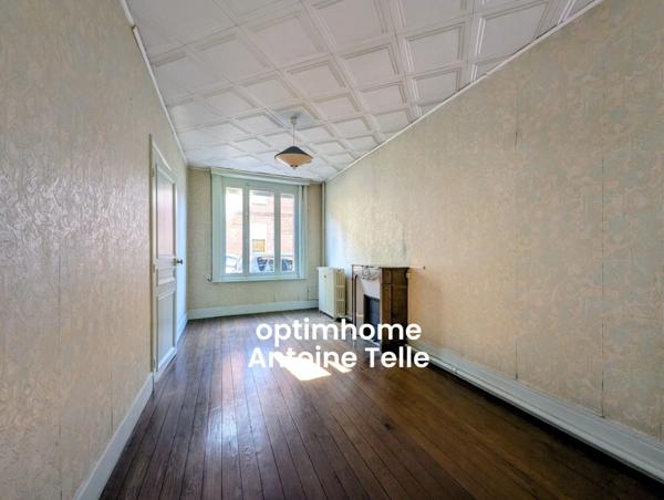 Le Cateau - Maison de ville avec jardin clos - Du cachet à moderniser !