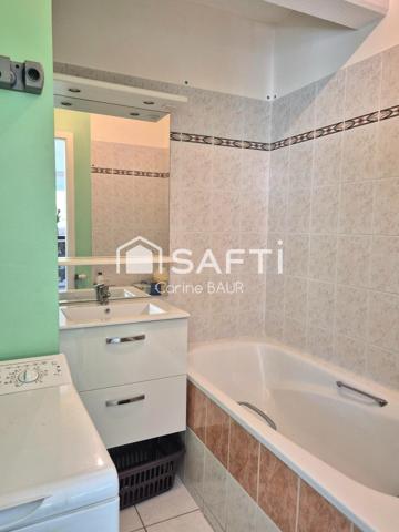 Appartement 4 pièces - 2 chambres - 2 salles de bain - 1 place de parking - 1 cave