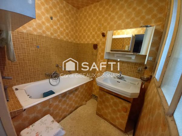 Maison ancienne de 121m² en centre ville, avec jardin