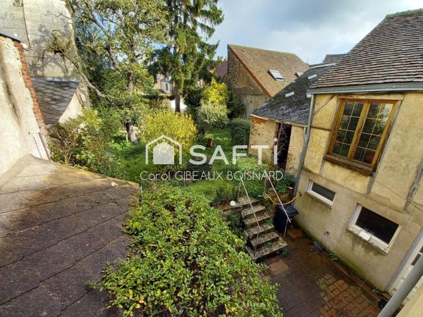 Maison ancienne de 121m² en centre ville, avec jardin