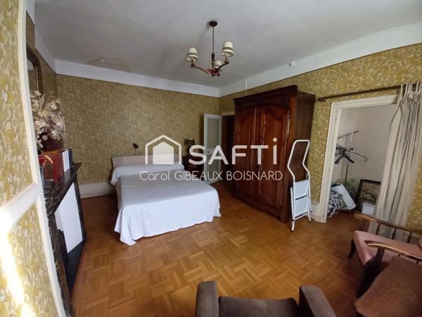 Maison ancienne de 121m² en centre ville, avec jardin