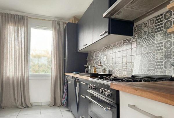 Maison familiale de 117 m² avec 4 chambres et jardin exposé Sud-Ouest
