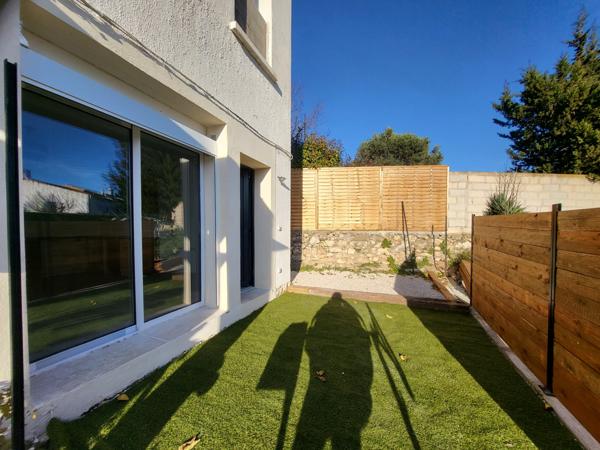 Saint-Mitre-les-Remparts (13920) APPARTEMENT RENOVE A NEUF REZ DE JARDIN AVEC PLACES DE PARKING