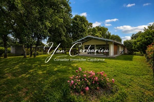 Villa d’architecte de plain-pied au cœur d’un environnement boisé préservé – 209 m² de lumière et d’espace