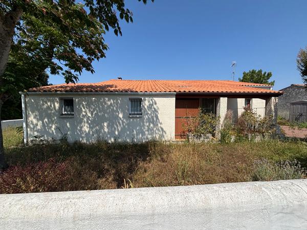 Maison de plain-pied avec garages et véranda - Au calme d'un village du Château-d'Oléron